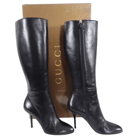 gucci black leather tall boots with gold front spurs|thigh high Gucci boots.